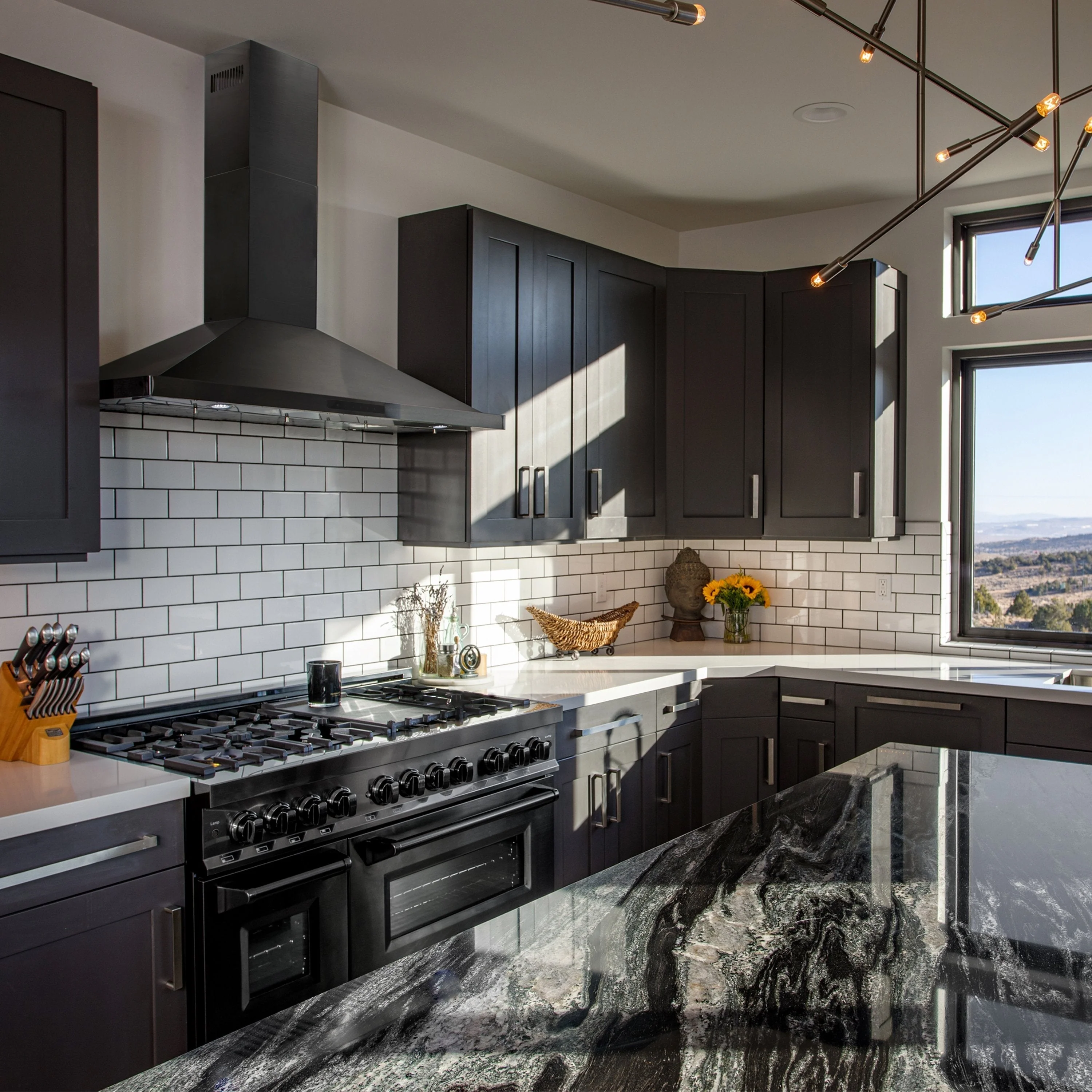 ZLINE 24" Convertible Wall Mount Range Hood in Black Stainless Steel with Set of 2 Charcoal Filters, LED lighting and Dishwasher-Safe Baffle Filters (BSKBN-CF-24) - Image 3